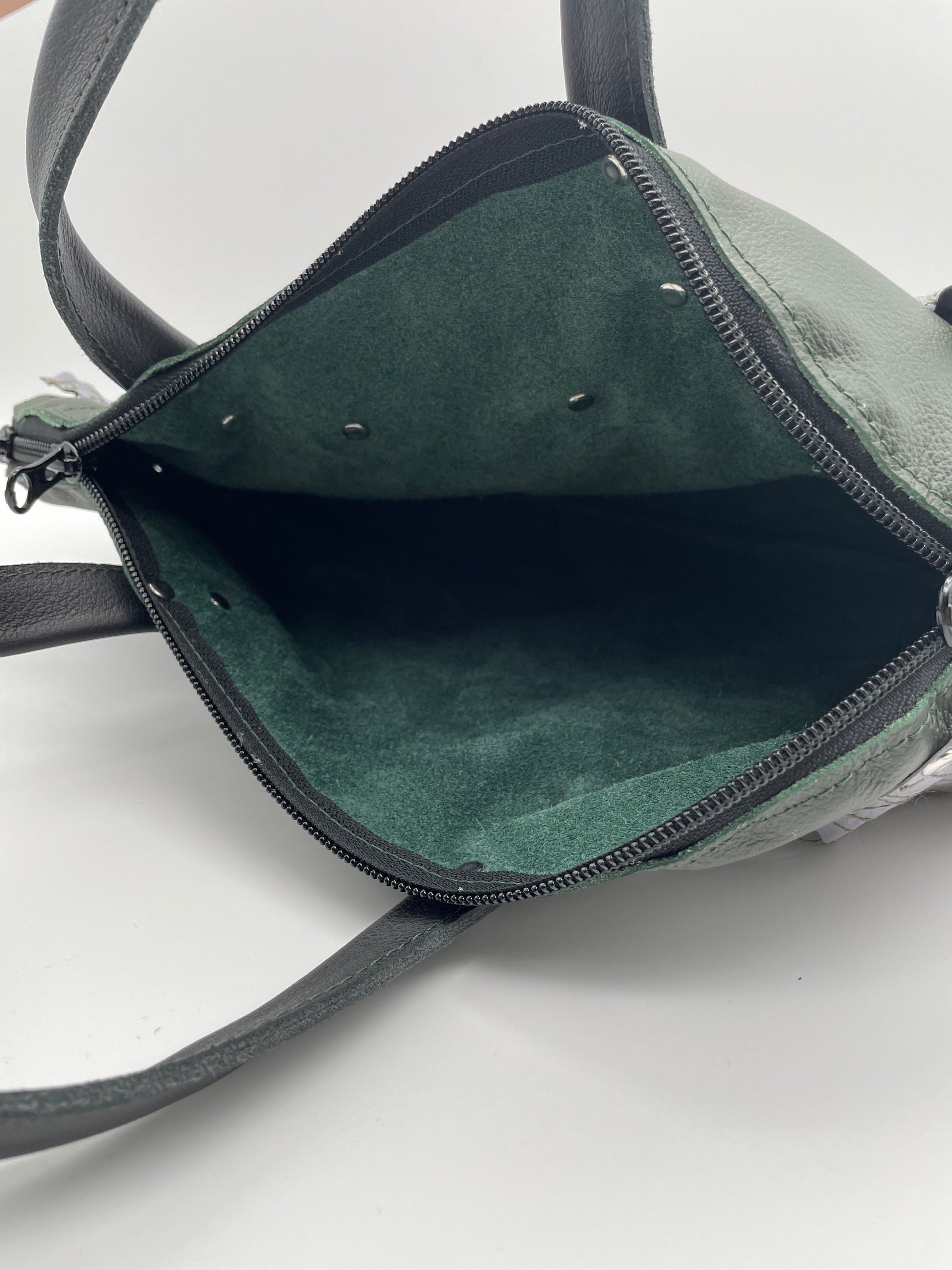 Upcycling bag REEBEL out of dark green upcycled leather 