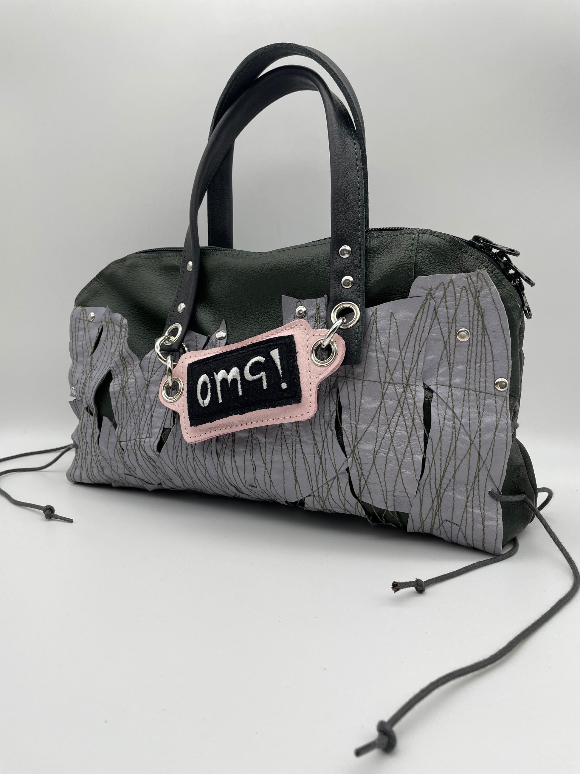 Upcycling bag REEBEL out of dark green OMGupcycled leather grey patchwork