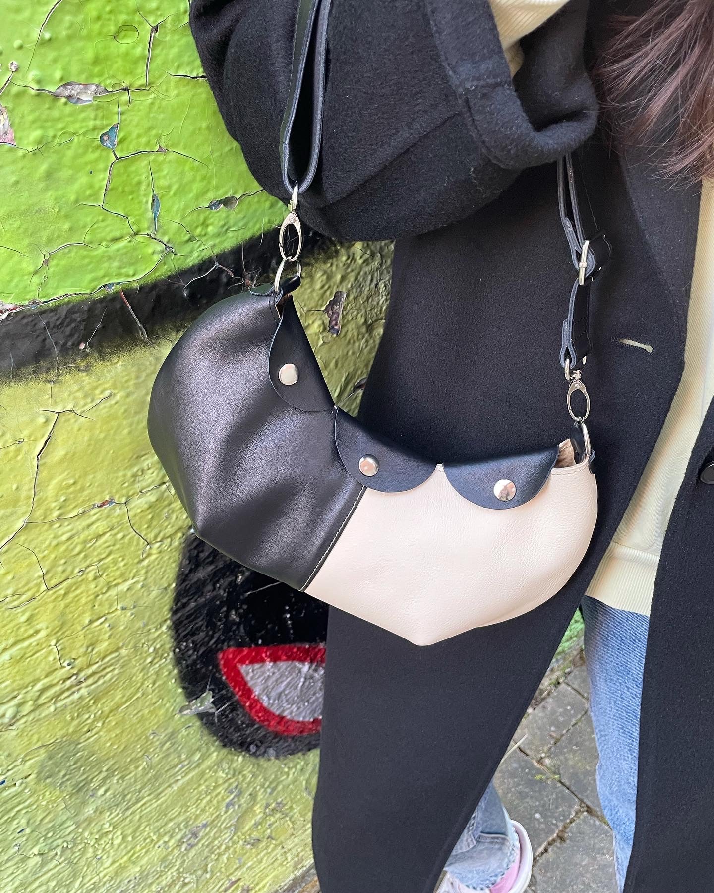 girl with handmade upcycling bag black white