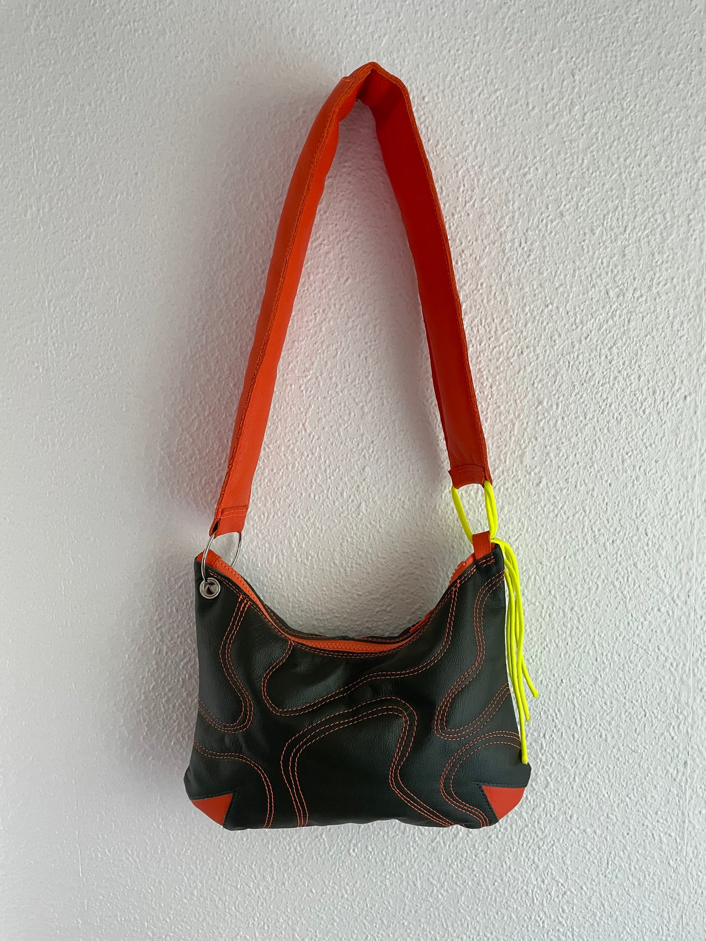 upcycling leather bag orange green waves padded neon yellow