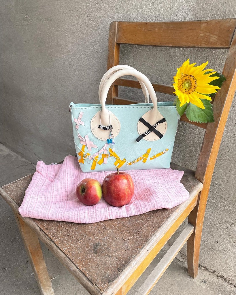 upcycling bag chair oliver leather deadstock handmade apple sunflower beads chains handmade