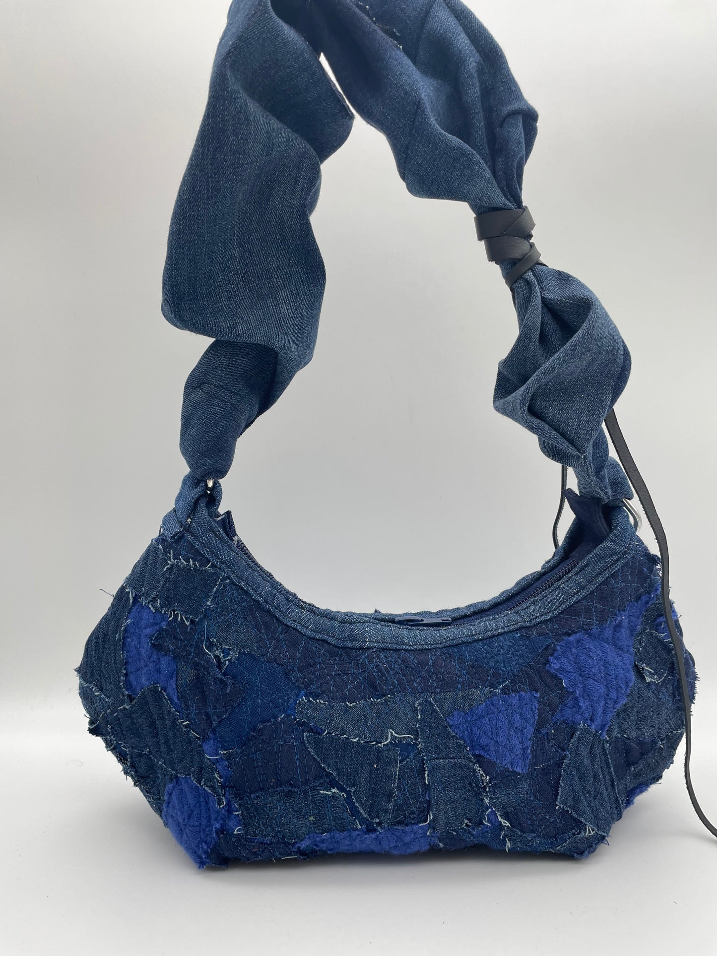 upcycled blue denim bag scrunchy bag zerowaste leather waste crazy sewed handbag