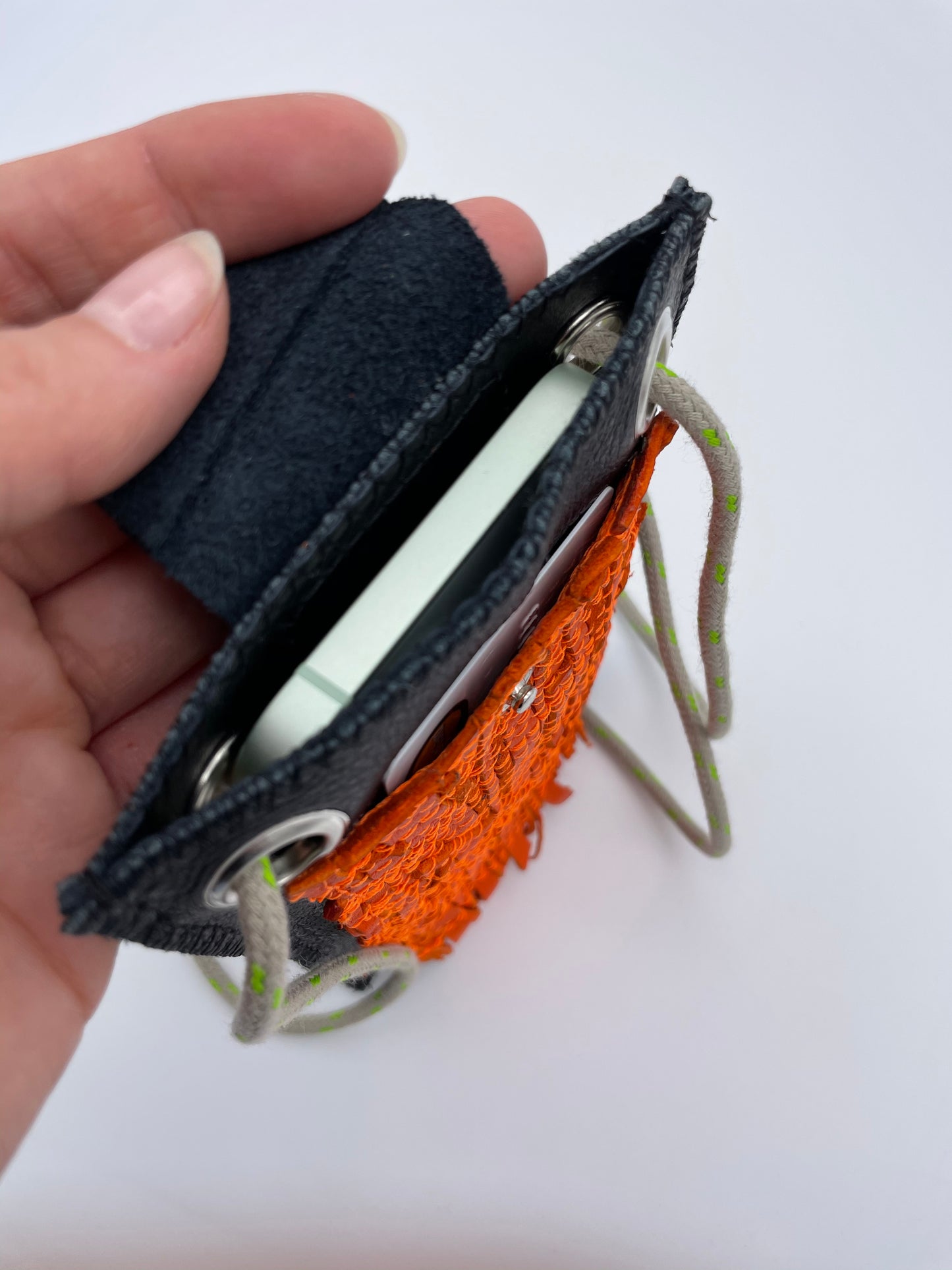 Upcycling phone case bag orange Mini Sling upcycled leather black zerowaste
