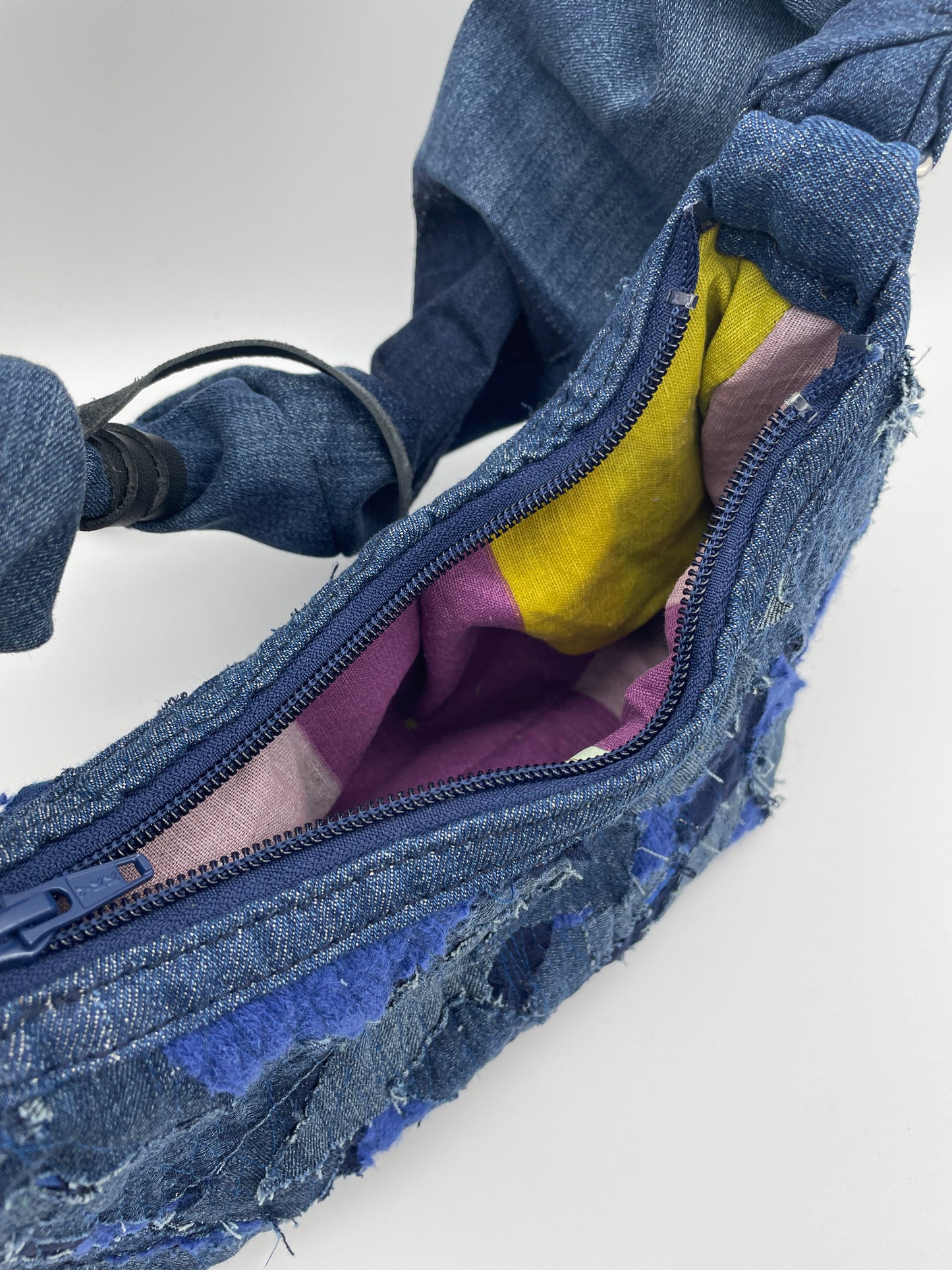 upcycled blue zipper denim bag scrunchy bag zerowaste leather waste crazy sewed handbag