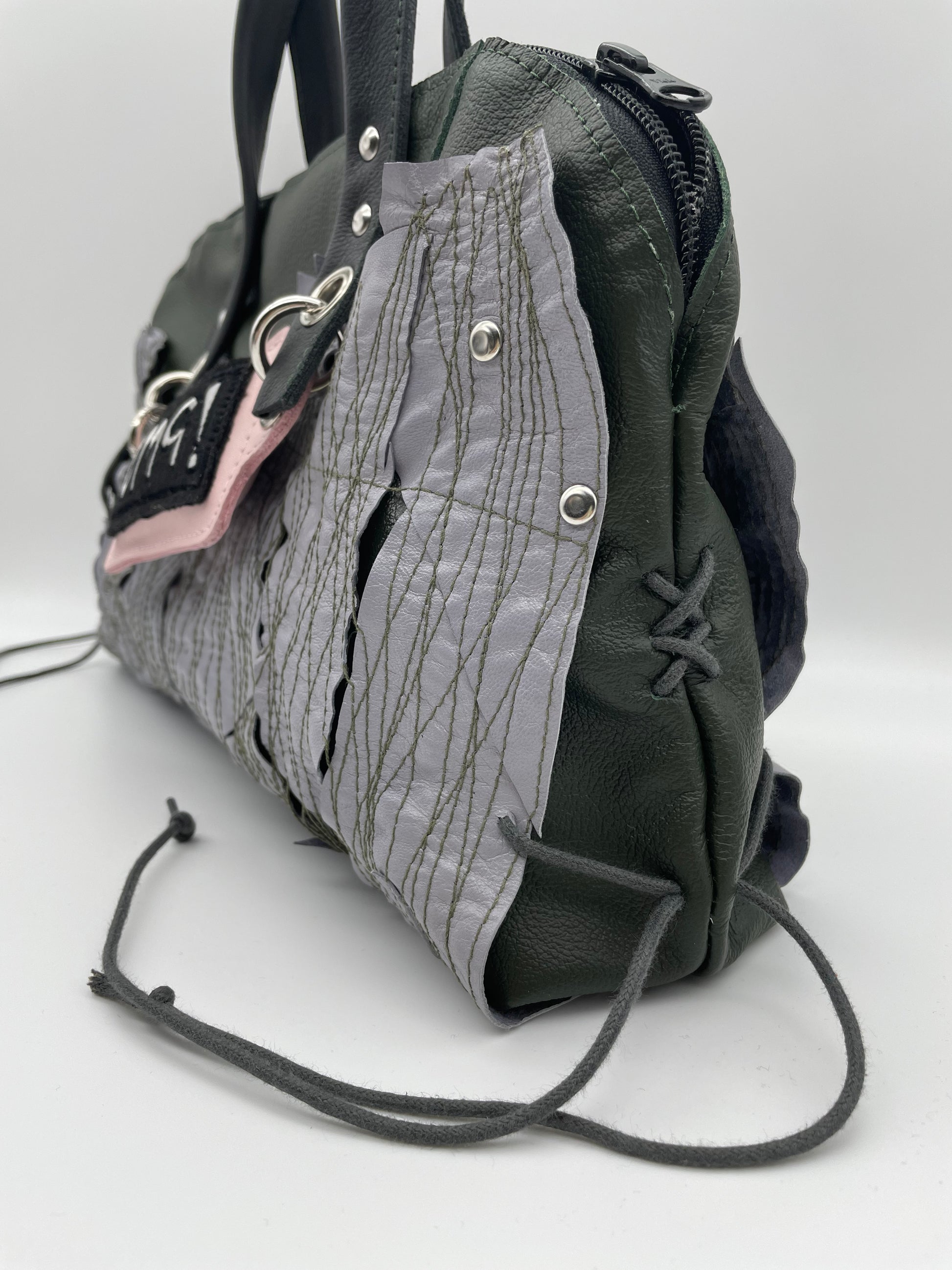 Upcycling bag REEBEL out of dark green OMG upcycled leather grey patchwork braided