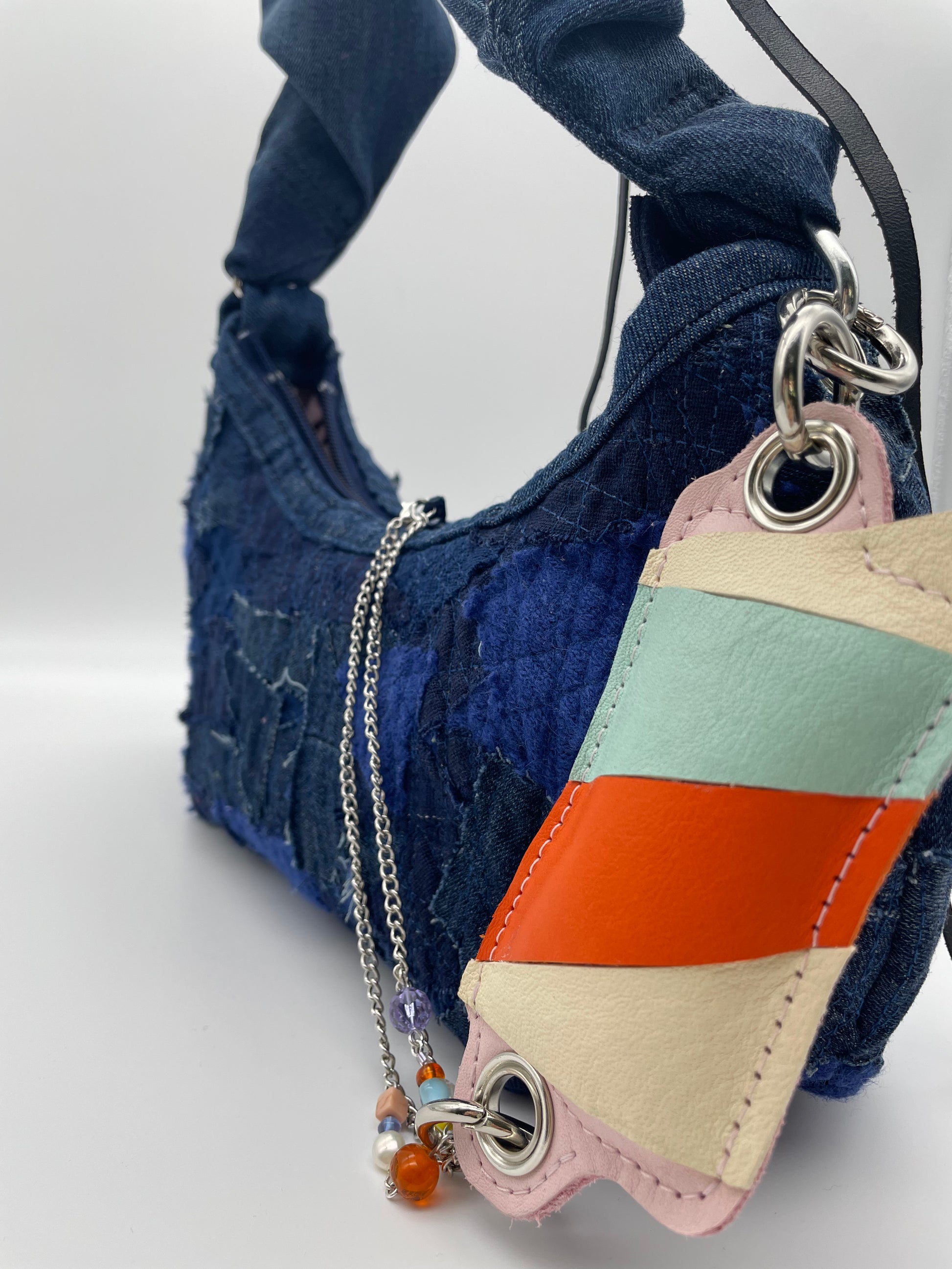 upcycled blue denim bag scrunchy bag zerowaste leather waste crazy sewed handbag pastel pink leather retro